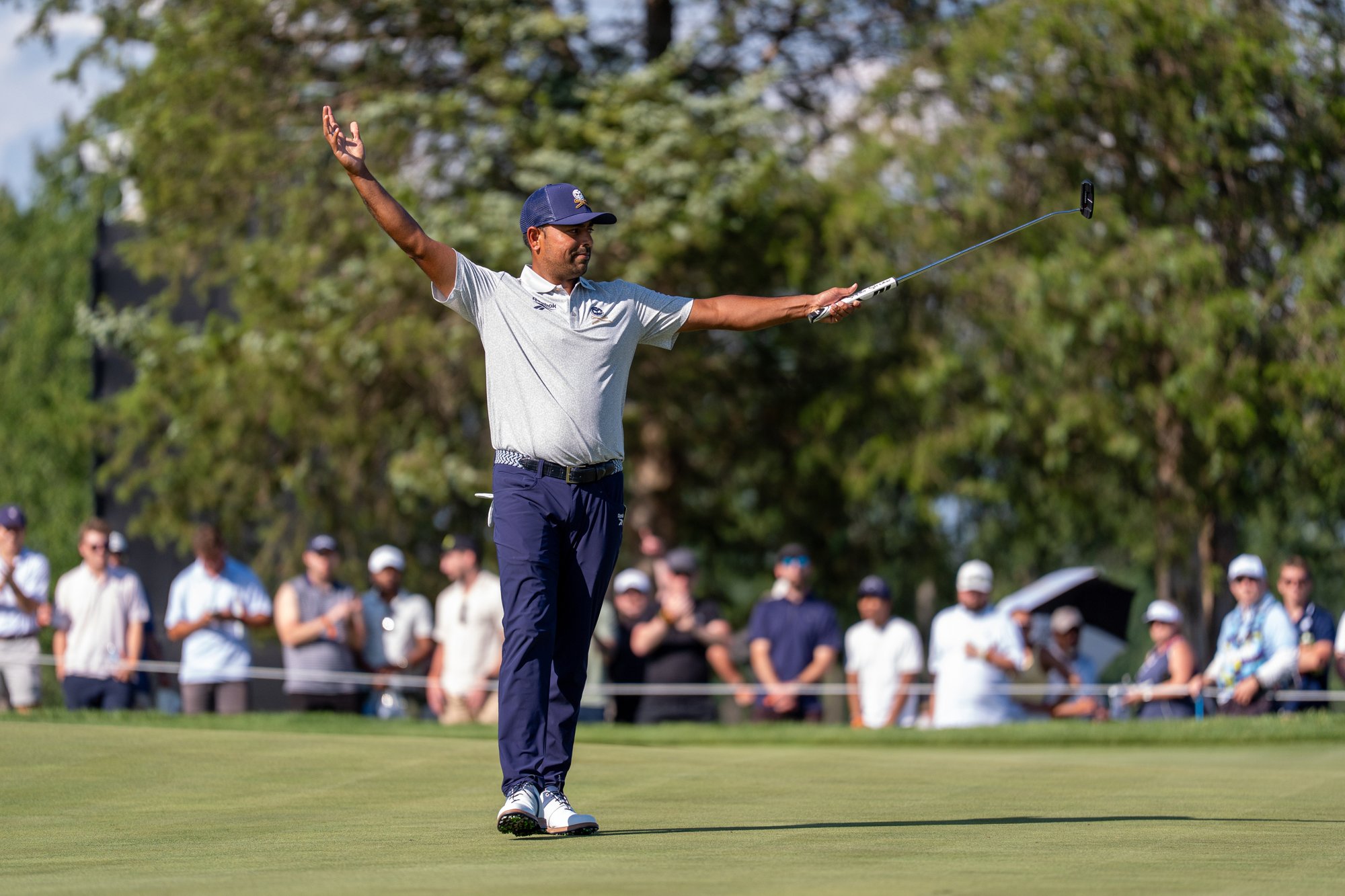 Anirban Lahiri celebrating on the green